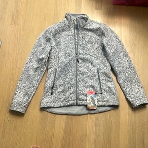 Slim fit fleece lined shell. Breathable, wind proof and water resistant.